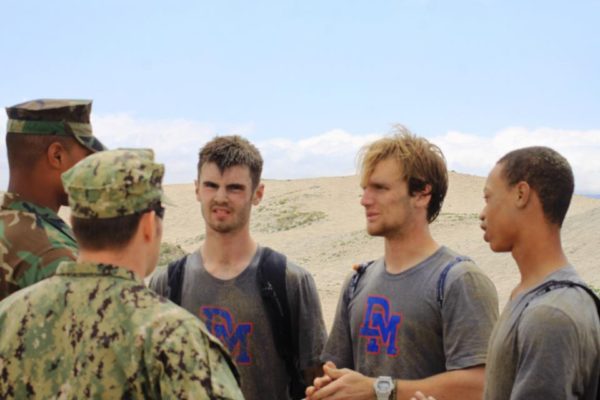 Garrett talking to a couple of Navy SEALS