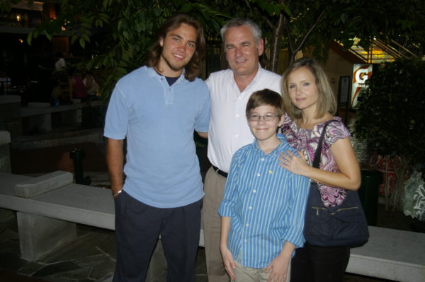 Warren with Eric's dad, step-mom Wendi and step-brother Brendan